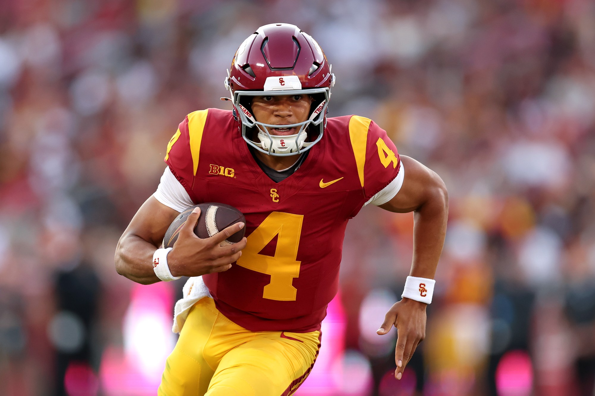 USC backup quarterback Husan Longstreet, shown running with the ball in a game against Missouri State at the Coliseum last season, announced that he is entering the transfer portal. (Photo by Luke Hales/Getty Images)
