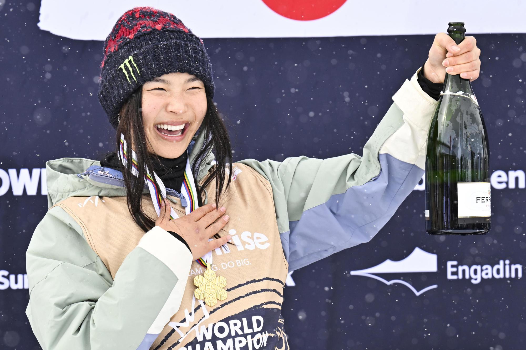 FILE – Gold medalist Chloe Kim of USA reacts on the podium after the Women’s Snowboard Halfpipe competition at the FIS Snowboard, Freestyle and Freeski World Championships in St. Moritz, Switzerland, Saturday, March 29, 2025. (Gian Ehrenzeller/Keystone via AP, File)
